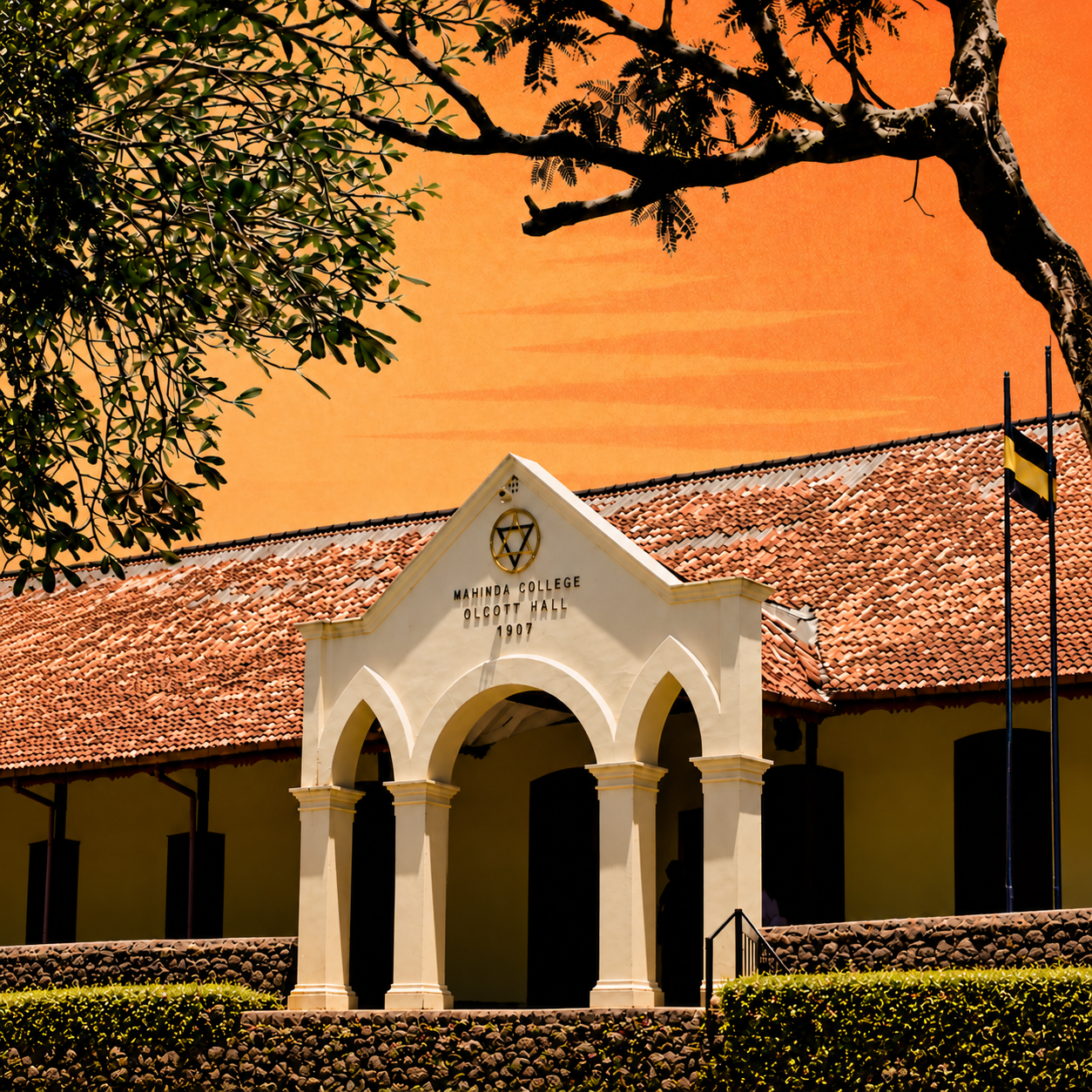 Mahinda College Olcott Hall framed by trees